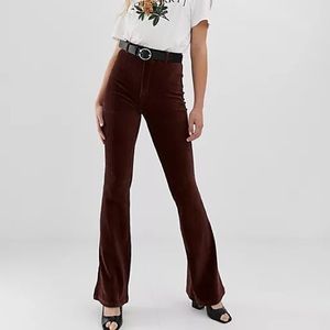 Stradivarius cord kickflare pants in red, size S.